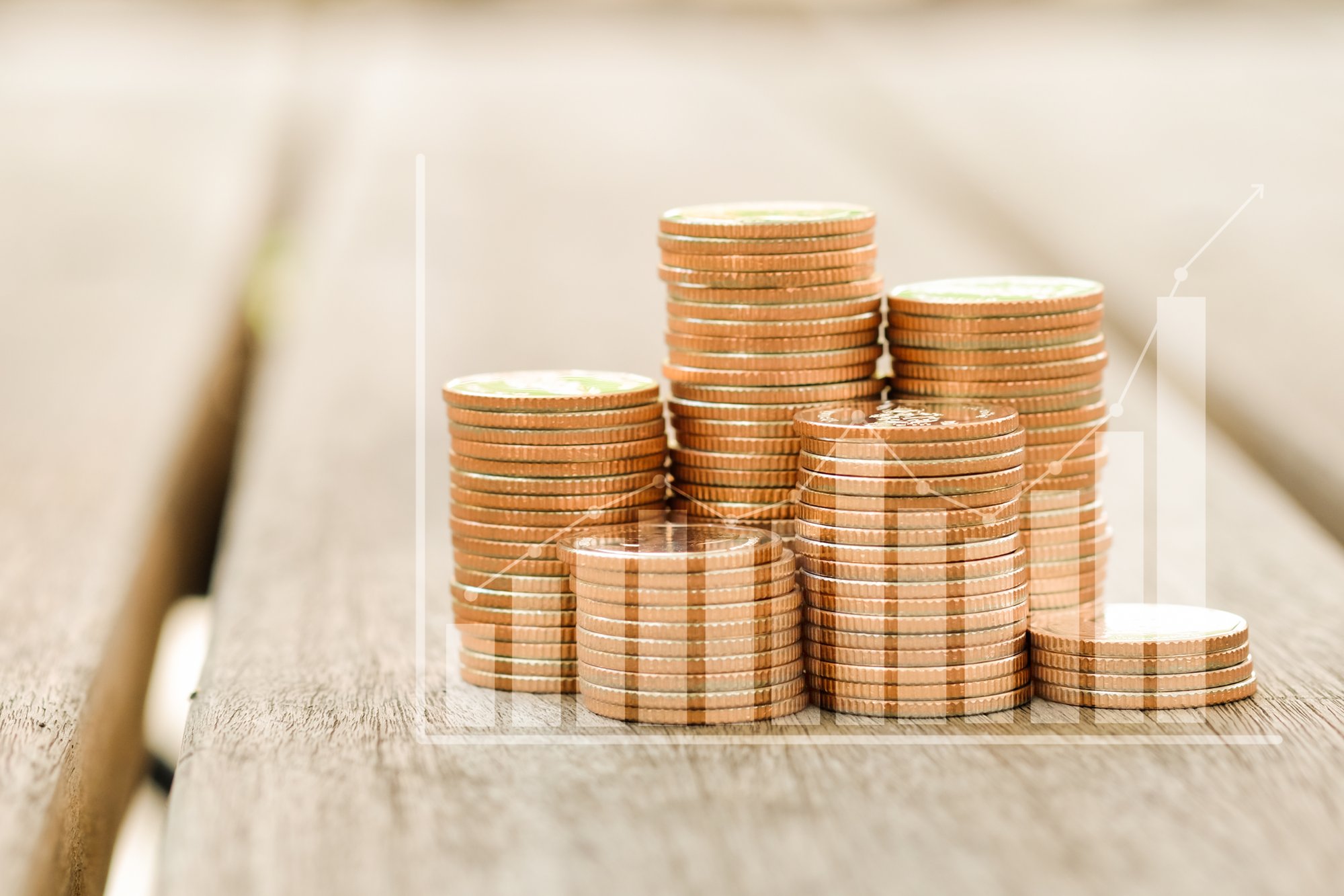 vecteezy_coins-stack-with-graph-stock-funding-or-money-saving_10813865_149